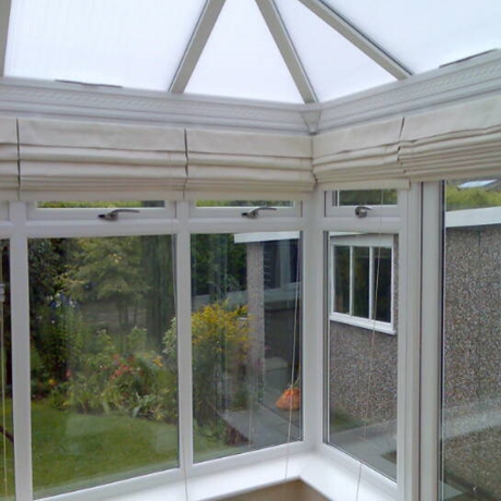 Conservatory roman blinds